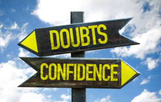 Doubts - Confidence signpost with sky background