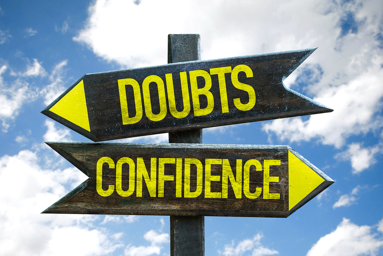 Doubts - Confidence signpost with sky background